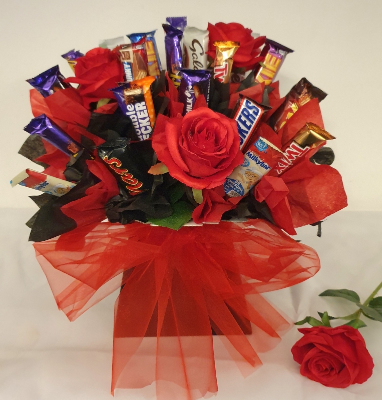 Confectionery and artificial flower bouquet